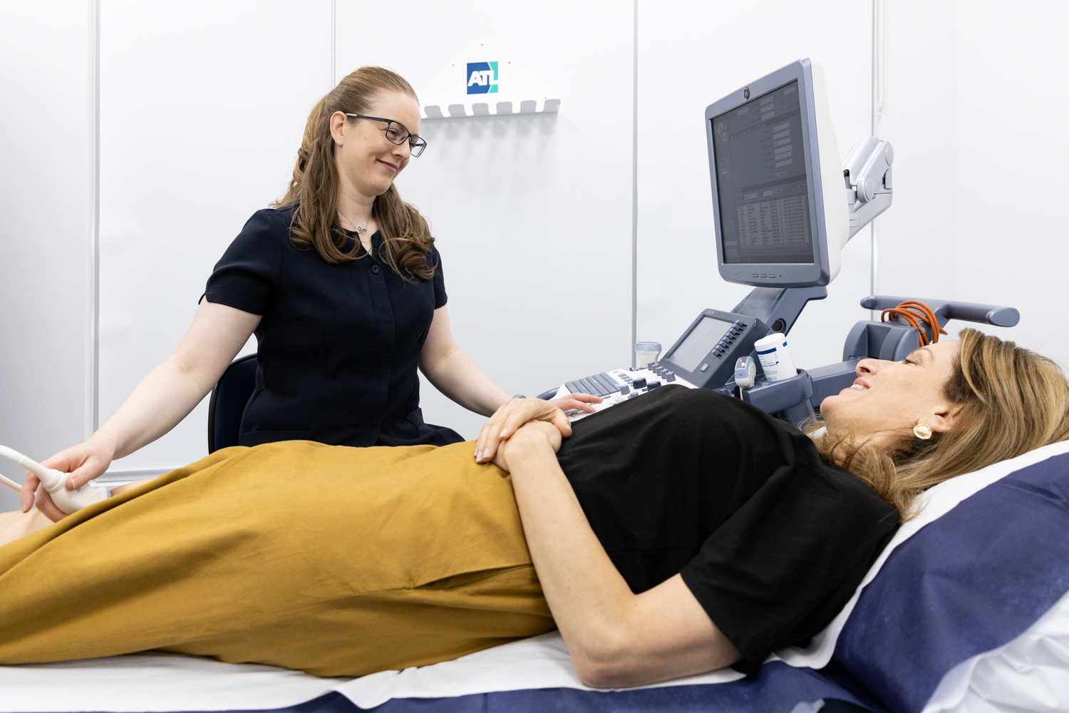 Doctor Performing Neck Ultrasound for Patient | Interventional Radiology Clinic | Radiology Tasmania