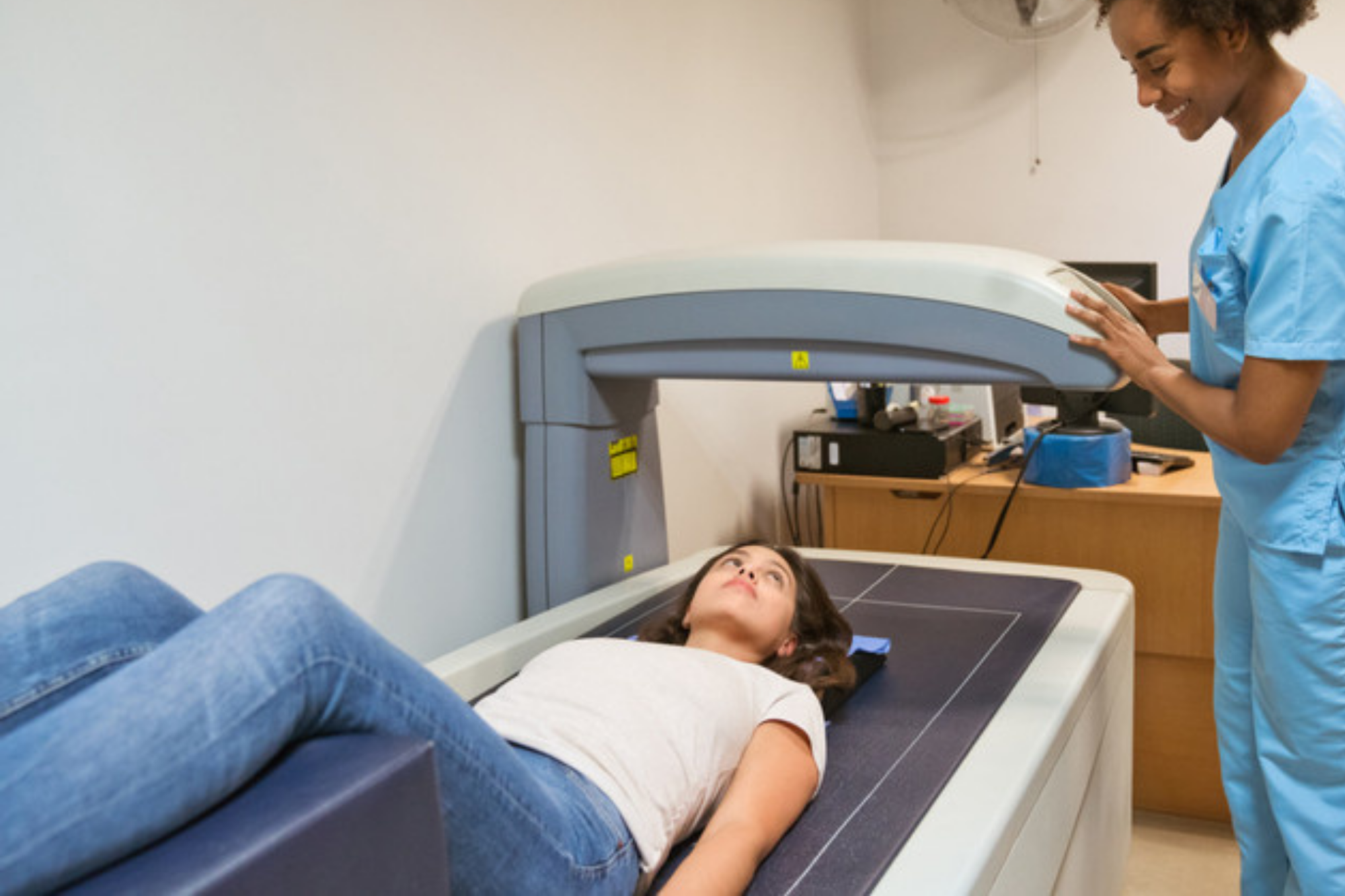 Radiographer performing Bone Densitometry on Patient | Bone densitometry Clinic | Radiology Tasmania